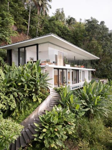 a house in the middle of a forest at Narra Hill Tagaytay in Laurel