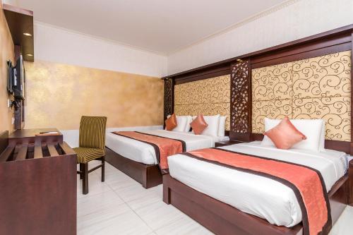 Postel nebo postele na pokoji v ubytování Mount Best Hotel- Mount Lavinia