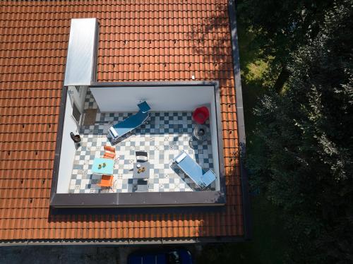 an aerial view of a tile floor on a roof at casa mileti in Vercurago
