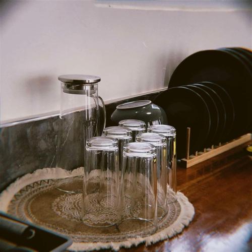 a group of glasses sitting on a table at CocoRico Siquijor in San Juan