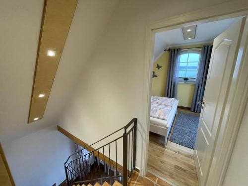 Ένα ή περισσότερα κρεβάτια σε δωμάτιο στο Ferienhaus Am Stein