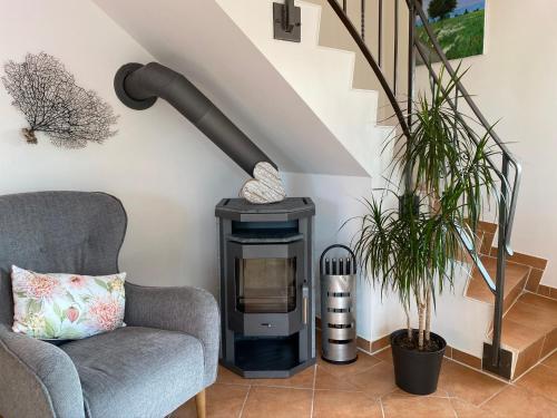 Posezení v ubytování Ferienhaus -Möwennest-