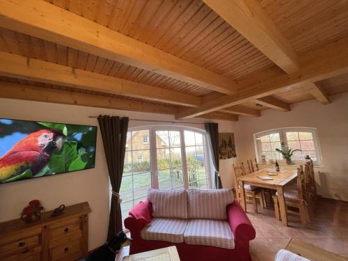 TV a/nebo společenská místnost v ubytování Ferienhaus Seebrise