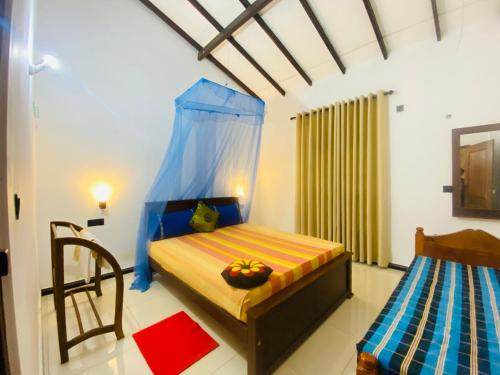 Postel nebo postele na pokoji v ubytování Priyavimana resort