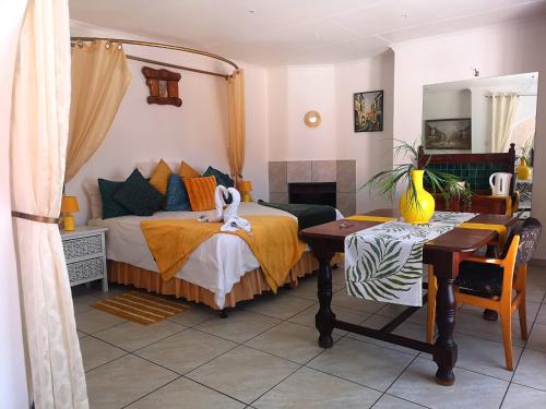 Ένα ή περισσότερα κρεβάτια σε δωμάτιο στο Elsjes Guesthouse