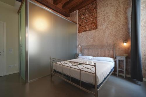 Postel nebo postele na pokoji v ubytování Palazzo di Giulietta - Juliet's Palace Verona