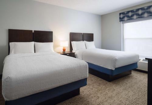 Ένα ή περισσότερα κρεβάτια σε δωμάτιο στο Hampton Inn & Suites Memphis East Germantown Area