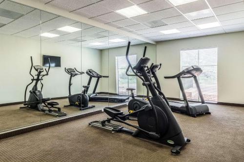 a gym with several exercise bikes in a room at Sleep Inn & Suites in Pleasanton