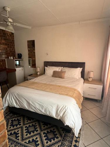 Postel nebo postele na pokoji v ubytování Tranquilo Guesthouse
