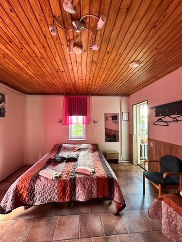 Postelja oz. postelje v sobi nastanitve Guesthouse Männiku