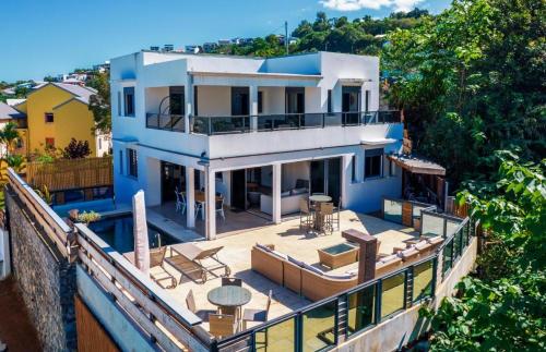 an aerial view of a house with a balcony at Villa Kaskavel in Les Avirons
