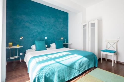 Ένα ή περισσότερα κρεβάτια σε δωμάτιο στο Casa do Plátano - Arraiolos