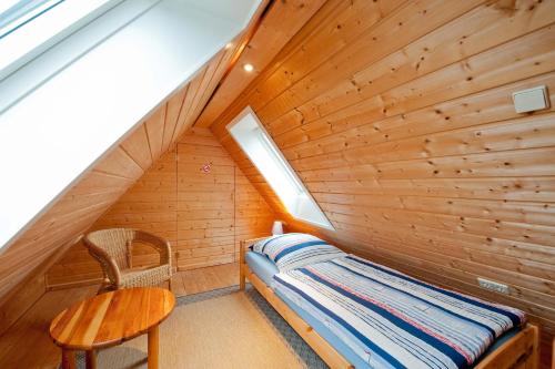 Postel nebo postele na pokoji v ubytování Ferienwohnung Im Hasengrund