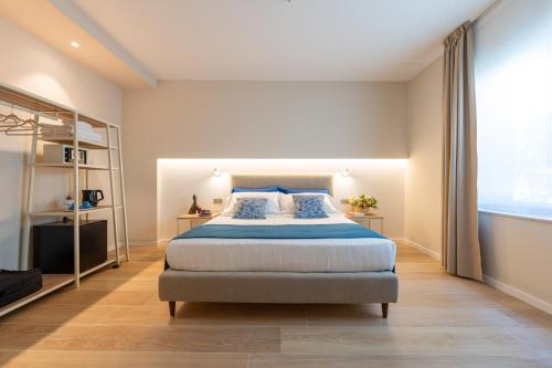 Katil atau katil-katil dalam bilik di Six Luxury Rooms Pozzuoli