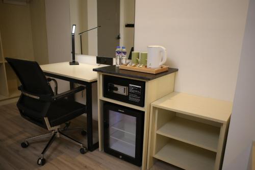 Kuchyň nebo kuchyňský kout v ubytování Hamersons Hotel CDO