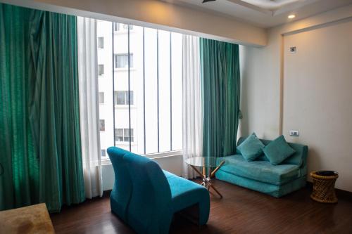 Ruang duduk di Mystic Apartotel Hebbal