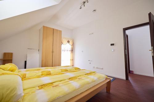 Katil atau katil-katil dalam bilik di Ferienhaus SWD