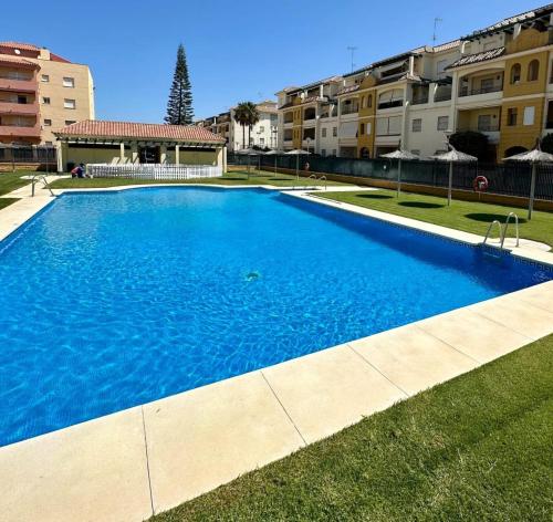 Swimmingpoolen hos eller tæt på Chipiona - Playa a 200m terraza piscina padel