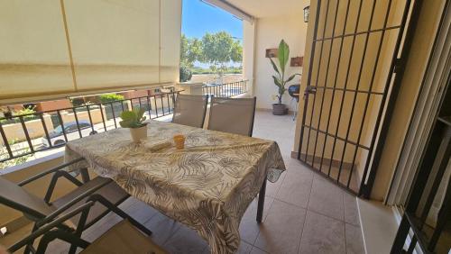 En balkon eller terrasse på Chipiona - Playa a 200m terraza piscina padel
