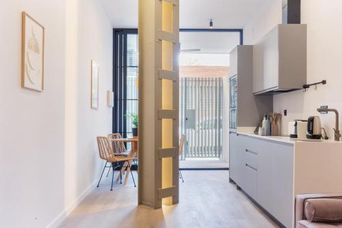 Kuchyň nebo kuchyňský kout v ubytování Mestalla Flats by Nomad Host