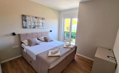 Postel nebo postele na pokoji v ubytování Villa S&L Srima Vodice