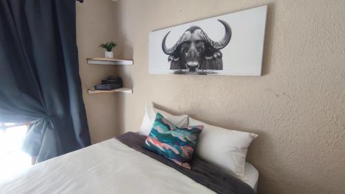 Una cama o camas en una habitación de Big5Haven