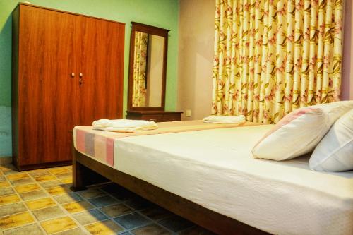 Postel nebo postele na pokoji v ubytování Danu Resort