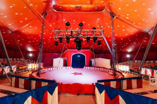 an arena with a stage in the middle of it at Eden Villas & Apartments in Albufeira