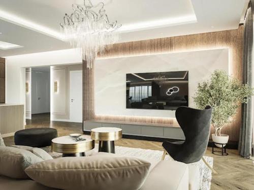 a living room with a couch and a piano at Labas in Šilalė