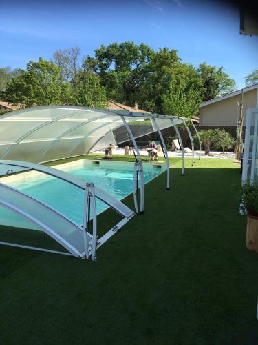 Swimmingpoolen hos eller tæt på Les Tamaris d'Audenge