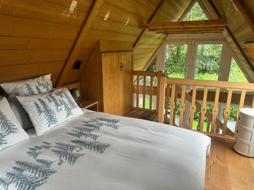 Postel nebo postele na pokoji v ubytování Hollhouse - Bed & Breakfast
