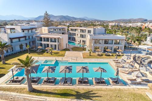an image of a swimming pool at a resort at Paralos Kosta Alímia in Hersonissos