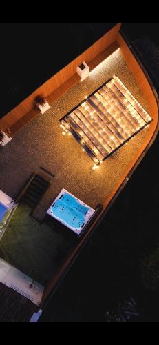 an overhead view of a table with two beds at Vento do Nordeste - Cottage with Jacuzzi in Nordeste