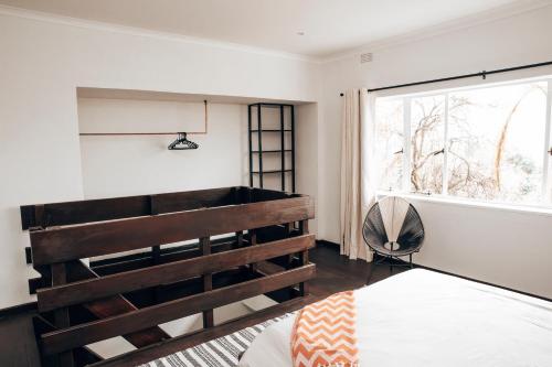 Ένα ή περισσότερα κρεβάτια σε δωμάτιο στο Skyline Pretoria Loft Style Apartment