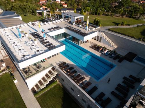 an overhead view of a building with a swimming pool at Aquangar in Cehu Silvaniei