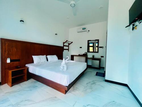 Letto o letti in una camera di Serendib villa