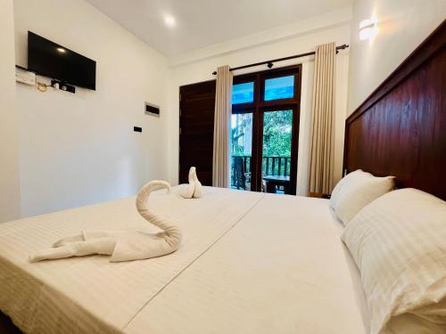 Letto o letti in una camera di Serendib villa