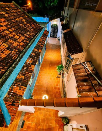 an overhead view of a building with a tile floor at Trại Hoa Vàng Homestay at Phú Yên in Ðông Tác (1)