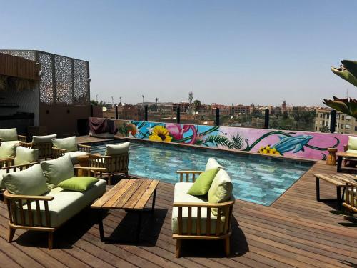 La alberca dentro o cerca de Hotel Le Rocher Marrakech
