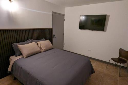 Postel nebo postele na pokoji v ubytování Santurce Studio near la placita 9
