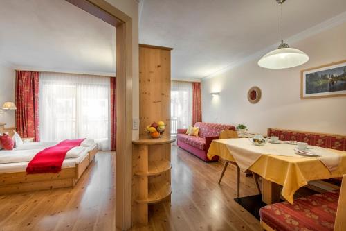 Ένα ή περισσότερα κρεβάτια σε δωμάτιο στο Residence Angelika