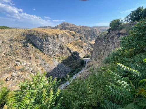a view of a canyon with a river on a mountain at Vahagni guest house in Garni in Garni