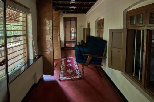 Posezení v ubytování The Mana-Heritage stay - Chengazhimattam Mana