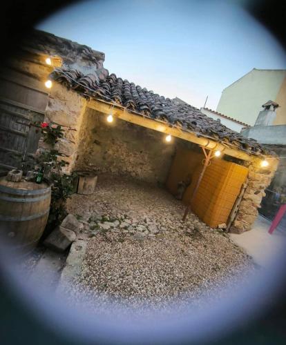 an outside view of a building with a courtyard at DA DANY e ELIA in Irgoli