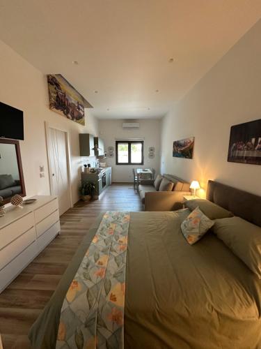 En eller flere senge i et værelse på Taormina Miramare Home