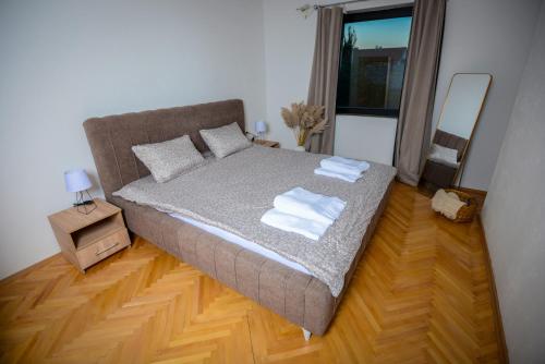 Ένα ή περισσότερα κρεβάτια σε δωμάτιο στο Make Inn Apartments