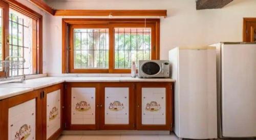 Kuchyň nebo kuchyňský kout v ubytování Complejo de alojamiento kempes Córdoba