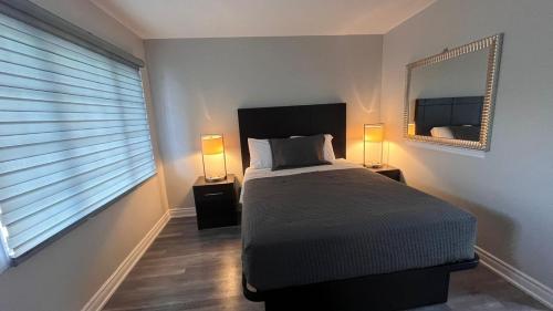 Postel nebo postele na pokoji v ubytování Miracle Motel