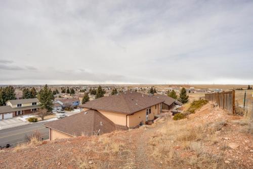 an aerial view of a house on a hill at Upscale Laramie Home with Hot Tub and Patio! in Laramie