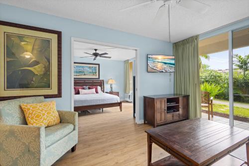 En eller flere senge i et værelse på MBH109 Charming & Updated Maui Banyan 2 Bath